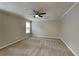 Inviting bedroom with ceiling fan and neutral color scheme at 2041 Kramer Way, Marietta, GA 30062
