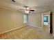 Bedroom with ceiling fan, neutral colored carpet and window at 2041 Kramer Way, Marietta, GA 30062