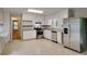 Well-lit kitchen with stainless steel appliances and white cabinets at 2041 Kramer Way, Marietta, GA 30062