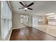Open-concept living area with hardwood floors and access to kitchen at 2041 Kramer Way, Marietta, GA 30062