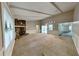 Spacious living room featuring a stone fireplace and neutral carpet at 2041 Kramer Way, Marietta, GA 30062