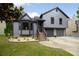 Charming gray two-story home featuring a well-manicured front yard and a two-car garage at 2872 Estuary Dr, Acworth, GA 30101