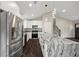 Modern kitchen with white cabinetry, granite countertops, stainless steel appliances, and a large island at 2872 Estuary Dr, Acworth, GA 30101