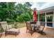Outdoor deck with table, chairs and grill, perfect for outdoor entertaining at 3361 Woodington Se Ct, Marietta, GA 30067