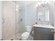 Modern bathroom with a glass-enclosed shower, stylish vanity, and updated fixtures at 3361 Woodington Se Ct, Marietta, GA 30067