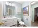 Inviting bathroom featuring a vanity with storage, artwork, and neutral color tones at 3361 Woodington Se Ct, Marietta, GA 30067