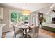 Bright breakfast nook with view of the living room and outdoor patio at 3361 Woodington Se Ct, Marietta, GA 30067