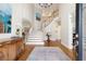 Grand foyer with hardwood floors, elegant staircase, and soaring ceilings at 3361 Woodington Se Ct, Marietta, GA 30067