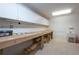 Garage interior with built in shelving and workspace with a sink at 3361 Woodington Se Ct, Marietta, GA 30067