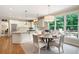 Bright kitchen with eat-in bar and breakfast nook, view to the backyard patio at 3361 Woodington Se Ct, Marietta, GA 30067