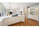 Open concept kitchen with granite island flows seamlessly into the living room at 3361 Woodington Se Ct, Marietta, GA 30067