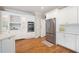 Spacious kitchen with custom cabinetry, stainless steel appliances, and hardwood floors at 3361 Woodington Se Ct, Marietta, GA 30067
