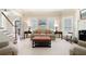 Bright and airy living room with large windows, fireplace, and elegant decor at 3361 Woodington Se Ct, Marietta, GA 30067