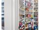 Walk-in pantry with ample shelving for organized storage, adjacent to kitchen at 3361 Woodington Se Ct, Marietta, GA 30067