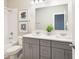 Bathroom featuring a double sink vanity, large mirror, and combined shower and tub at 3810 Jack Vernon Cir, Powder Springs, GA 30127
