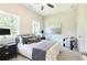 Cozy bedroom featuring a comfortable bed and natural light at 3810 Jack Vernon Cir, Powder Springs, GA 30127