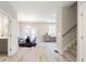 Open concept: Dining room adjacent to kitchen, and stairs to second floor at 3810 Jack Vernon Cir, Powder Springs, GA 30127