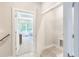 Laundry area with neutral colors, wire shelf, and connection points at 3810 Jack Vernon Cir, Powder Springs, GA 30127