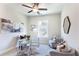 Home office with modern decor, a glass desk, and comfortable seating at 3810 Jack Vernon Cir, Powder Springs, GA 30127