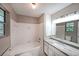Neutral full bathroom with tub, shower, and vanity at 5807 Christopher Ln, Lithonia, GA 30058