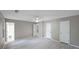 Neutral bedroom with ceiling fan, and access to en-suite bathroom at 5807 Christopher Ln, Lithonia, GA 30058