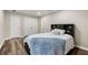 Spacious bedroom with closet and stylish flooring for a modern appeal at 9701 Buice Rd, Alpharetta, GA 30022