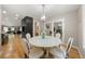 Cozy breakfast nook next to the kitchen, great lighting, and access to the outdoors at 9701 Buice Rd, Alpharetta, GA 30022