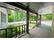 Charming front porch with lovely landscaping and a peaceful outdoor ambiance at 9701 Buice Rd, Alpharetta, GA 30022
