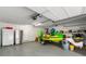 Spacious garage with jet ski and ample storage space at 9701 Buice Rd, Alpharetta, GA 30022