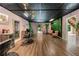 Large, bright open room with unique design elements and ample space at 9701 Buice Rd, Alpharetta, GA 30022