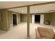 Finished basement with neutral carpet, and access to storage at 2504 Dalesford Ct, Dacula, GA 30019