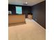 Finished basement area featuring carpet and wet bar at 2504 Dalesford Ct, Dacula, GA 30019