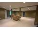 Spacious basement featuring neutral carpet, modern recessed lighting, and a flexible layout at 2504 Dalesford Ct, Dacula, GA 30019