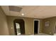 Finished basement with archway entrance and carpeting at 2504 Dalesford Ct, Dacula, GA 30019
