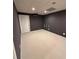 Finished basement room with dark paint and recessed lighting at 2504 Dalesford Ct, Dacula, GA 30019