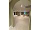 Large basement living area with ample lighting and seating at 2504 Dalesford Ct, Dacula, GA 30019