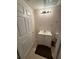 Small full bathroom with vanity, mirror and medicine cabinet at 2504 Dalesford Ct, Dacula, GA 30019