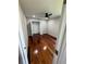 Bedroom with hardwood floors, neutral walls, and an open closet at 2504 Dalesford Ct, Dacula, GA 30019