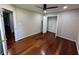 Bedroom with wood floors, ceiling fan and closet at 2504 Dalesford Ct, Dacula, GA 30019
