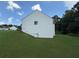 Home exterior showing the backyard lawn, siding, and foundation at 2504 Dalesford Ct, Dacula, GA 30019