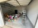 Attached garage providing secure parking and storage, equipped with an automatic door opener at 2504 Dalesford Ct, Dacula, GA 30019