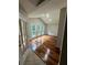 Bright living room filled with natural light from large windows and hardwood floors at 2504 Dalesford Ct, Dacula, GA 30019