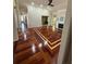 Spacious living room featuring hardwood floors, fireplace, and open floor plan at 2504 Dalesford Ct, Dacula, GA 30019