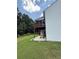 Sideyard patio with deck overtop of it at 2504 Dalesford Ct, Dacula, GA 30019