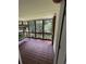 Cozy screened-in porch with a swing for relaxing outdoors at 2504 Dalesford Ct, Dacula, GA 30019