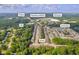 Aerial view of community amenities, home, I-85, Publix, and Walmart in Buford, GA at 2677 Sardis Chase Ct, Buford, GA 30519