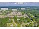 Aerial view of home near Lake Lanier, Hamilton Mill Rd, and community amenities in Buford, GA at 2677 Sardis Chase Ct, Buford, GA 30519