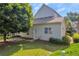 Exterior showing backyard with well-kept grass and a landscaped perimeter at 2677 Sardis Chase Ct, Buford, GA 30519