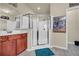 Bathroom features a modern shower with glass doors, vanity, and neutral tones at 2677 Sardis Chase Ct, Buford, GA 30519