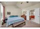 Cozy bedroom with vaulted ceiling, large windows, a walk-in closet and ensuite bathroom at 2677 Sardis Chase Ct, Buford, GA 30519